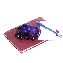 Load image into Gallery viewer, Bronze cast of sleeping elephant statue on stationary material
